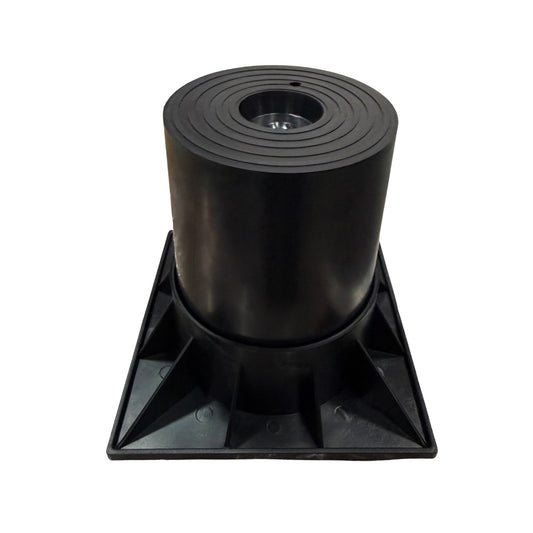 Four 6-inch heavy-duty heat pump risers for elevating an outdoor HVAC unit.